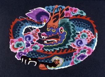 Découpe de papier chinois colorée avec un dragon
