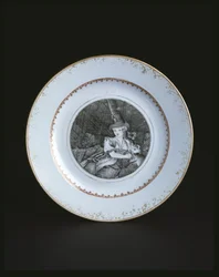Assiette blanche bordée d