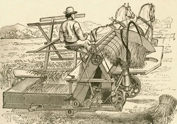 Une machine de récolte, tirée par des chevaux, qui liait mécaniquement les gerbes de blé, utilisée à la fin du XIXe siècle. Du Museo Popular publié à Madrid