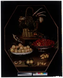 Nature morte avec grenades et raisins dans un panier