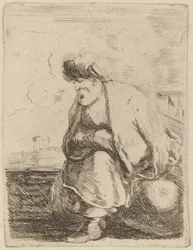Un vieux Turc avec turban assis sur un rocher