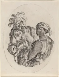 Palefrenier noir avec un cheval arabe