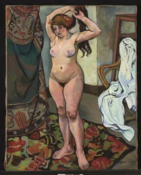 Gilberte nue se coiffant