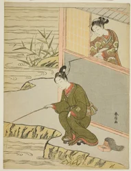 Beauté taquinant un jeune homme pêchant