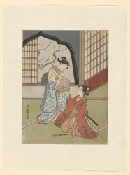 Un couple avec une cage à oiseaux