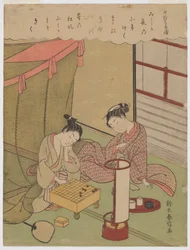 Oiran et jeune homme jouant au shogi par une soirée d