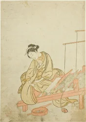 Jeune femme au métier à tisser