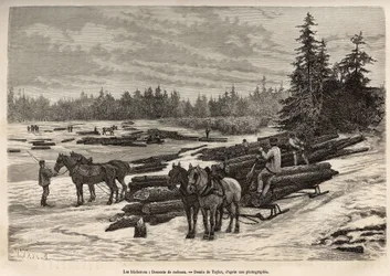 La descente des radeaux en Ontario, les bûcherons déchargent les troncs coupés et les installent sur la rivière gelée, puis lors du dégel, les troncs seront emportés par le courant jusqu