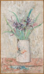 Iris dans un vase blanc