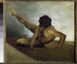 Homme nu tourne sur le sol