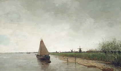Paysage fluvial avec des navires, une ville au-delà