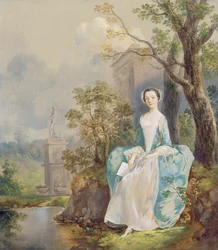 Fille avec un livre assise dans un parc