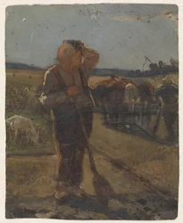Fermier debout avec une pelle sur le terrain