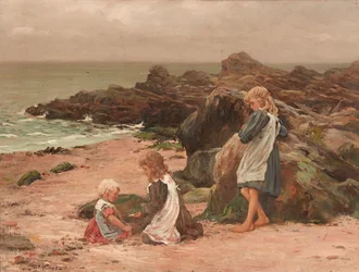 Enfants sur une plage rocheuse