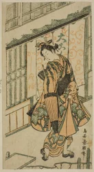 Jeune femme tenant un parapluie