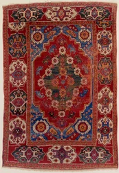 Tapis transylvanien avec motifs floraux sur fond rouge brique, fin XVIIe siècle