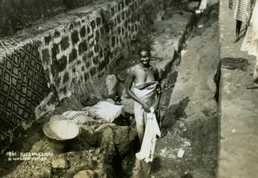 Une blanchisseuse, Sierra Leone
