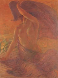 Femme seins nus portant un voile comme robe