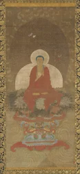 Bouddha en trône sur un tapis de Kusa