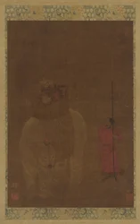 Éléphant caparaçonné et son assistant