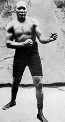 Jack Johnson, premier champion du monde de boxe poids lourd noir, 1908