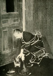 John Nevil Maskelyne réalise une illusion de cabinet spirituel, c1910