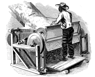 Égreneuse à scie pour nettoyer le coton, actionnée par un travailleur noir aux pieds nus, sud des États-Unis, 1865
