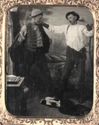 Deux hommes simulant un combat dans un studio, vers 1860