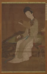 Jeune femme lisant un livre de poèmes, dynastie Ming, 16ème-17ème siècle