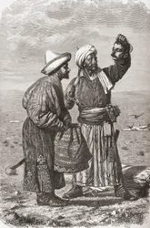 Un soldat afghan tenant la tête coupée de son ennemi, illustration de 