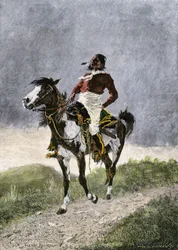 Un brave Comanche, voyageant à cheval dans les prairies du sud (Texas, Oklahoma, USA), vers 1800. Lithographie