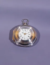 Montre marine, en double boîtier en argent, par John Harrison et Fils