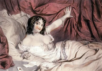 Femme nue sur un lit