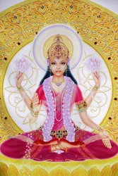 Lakshmi, déesse de la richesse et épouse de Lord Vishnu, tenant des fleurs de lotus