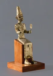 Figurine assise de Baal, le dieu cananéen de la guerre, Megiddo, vers 1300-1200 av. J.-C.