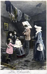 La charité : une nonne visitant des pauvres, vers 1910