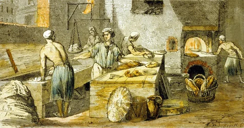 Le boulanger dans la boulangerie