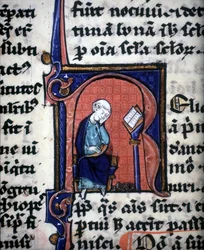 Une lettre miniature « R » représentant un sage, tirée d