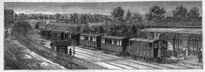 Application des batteries Faure : Train électrique sur une voie ferrée dans une gare. Gravure dans "Le Monde Illustré"