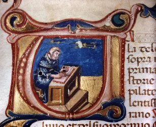 Moine copiste. Manuscrit du 13ème siècle. Biblioteca Trivulziana, Milan
