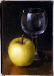 Verre et pomme jaune