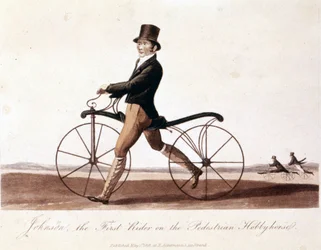 Johnson sur un vélo. Modèle inventé par le Baron von Drais : la draisienne. Fabriqué en bois sans pédales. Lithographie en couleur de 1819