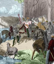 À la veille de la Bataille de Vouillé (507), Clovis I trouve, suivant une biche, une gue sur la Vienne révélée par des lys. Il porte la fleur comme gage de victoire puis la prend comme emblème. Gravure dans « Histoire De France En Cent Peintures » par Paul