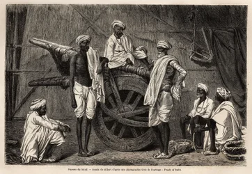 Paysans du Scind (région du Pendjab, Inde), à côté de leurs machines agricoles. Gravure pour illustrer le voyage au Pendjab et au Cachemire, récit par Guillaume Lejean, en 1866, publié dans « Le tour du monde, nouveau journal des voyages »