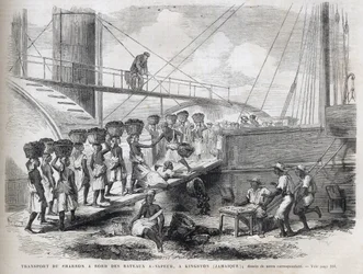 Transport de charbon à bord de navires à vapeur à Kingston (Jamaïque) - Chargement de charbon à Kingston - Jamaïque - Gravure de 1866 de « L