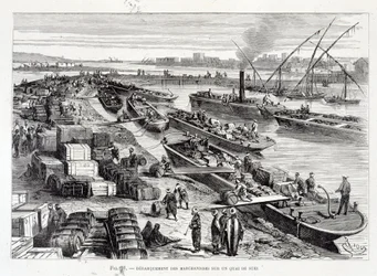 Débarquement de marchandises sur un quai du canal de Suez