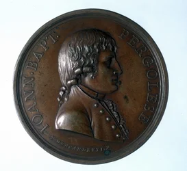 Portrait de Giovanni Battista Pergolesi (Jean Baptiste Pergolese, Jean-Baptiste) (1710 - 1736). Médaillon en bronze. Museo della Scala. Milan