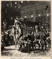 Saltimbanques de rue : jongleurs, équilibristes et acrobates, lors de spectacles nocturnes, à la foire annuelle d