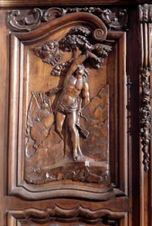 Le martyre de Saint Sébastien (détail) de la porte en bois sculptée de l
