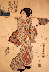 Femme avec un éventail rigide